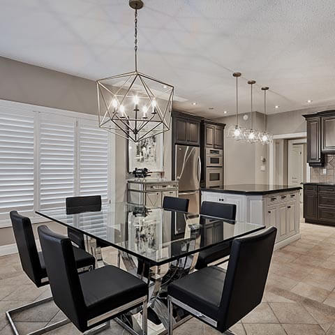 Modern glass dining room table and chairs.