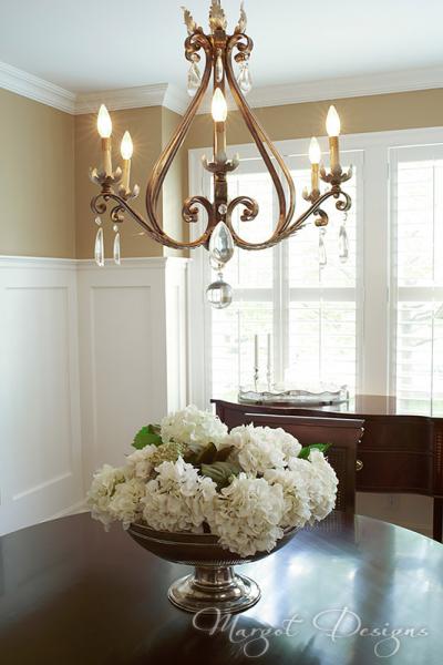 Dining room table and chandelier.